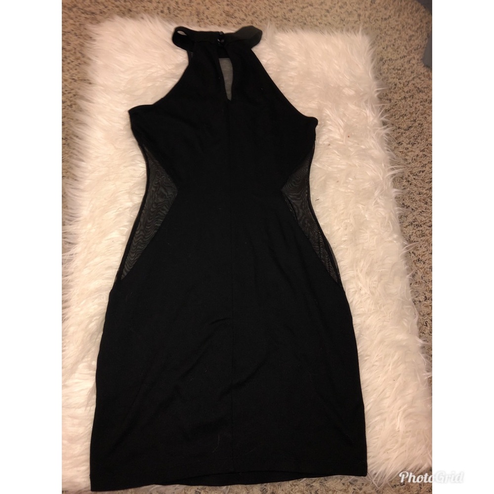 Black dress with parts of mesh